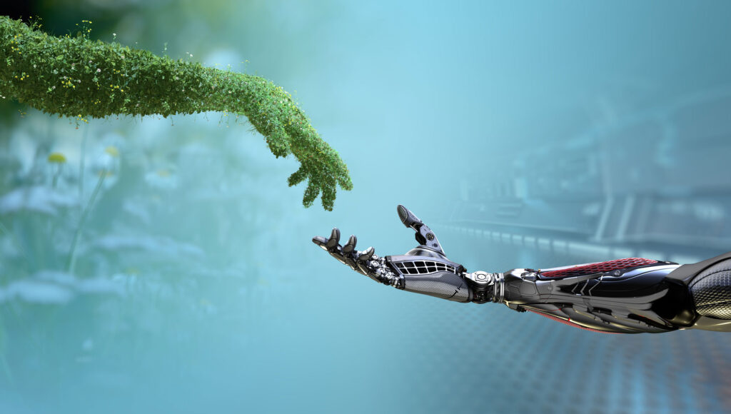 Arm mit Gras bedeckt und Roboterhand. Bildquelle: willyam-stock.adobe.com